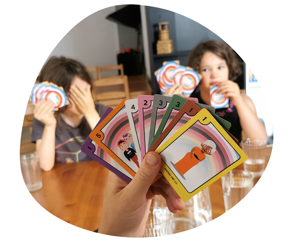 Children enjoying the Happy Families Progress Edition Card Game